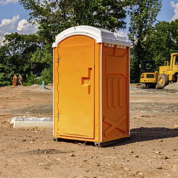 how often are the portable restrooms cleaned and serviced during a rental period in Oscoda MI